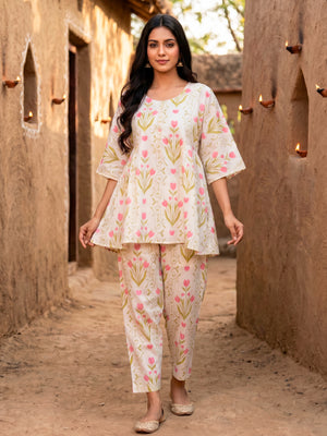 Flared short Kurta with Salwar in all over floral print