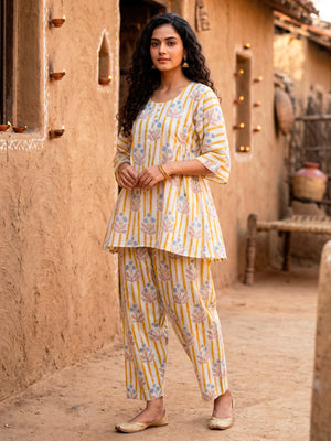Flared short Kurta with Salwar in stripes with floral block print