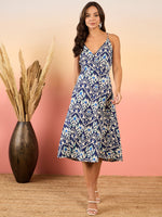 Overlap neck Flared midi Dress in Blue Ikkat Print