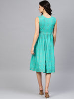 Printed Midi Dress with asymmetric overlap neck in Mint Blue